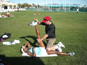 Mark Kovacs stretching Sloane Stephens